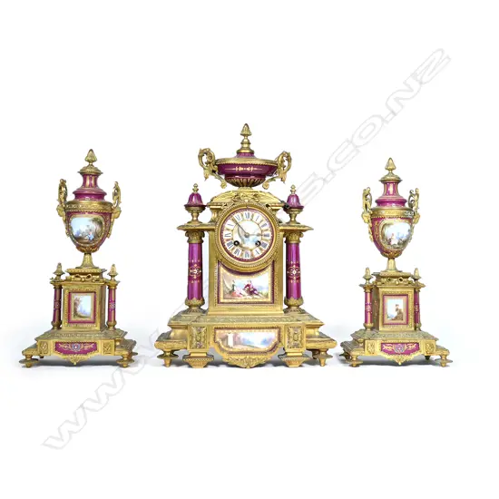 A good French 19thC ormolu and porcelain three-piece clock garniture