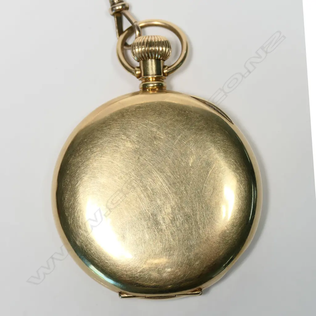 A good heavy 14ct gold cased hunter pocket watch, enamel dial with Roman numerals, signed 'Waltham USA', with subsidiary sunken seconds dial, monogramed front plate, presentation engraved gold dust cover dated 1936. 17 jewel movement engraved Royal A.W.W.Co., Waltham, Mass. Total weight 105gm, on 9ct gold fancy link chain 41cm (16"), 10gm. Image 1++