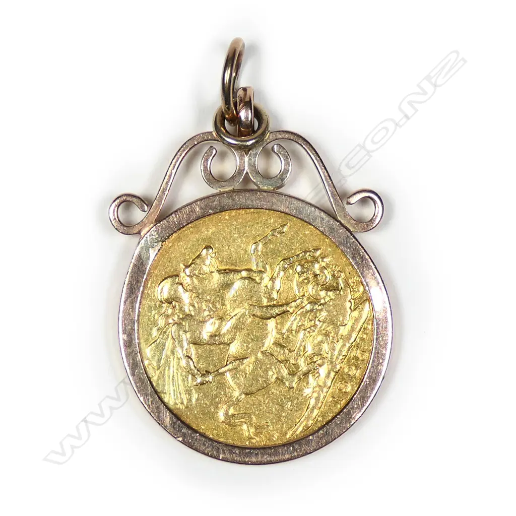 A gold 1925 full sovereign, in a 9ct gold pendant mount with gold suspension rings, 12gm. Image 1++