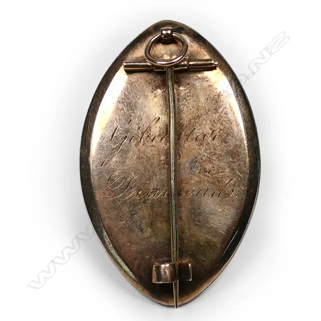 A fine Georgian gold and silver pendant/brooch, the frame set with ‘Gibraltar diamonds’ (fine quartz crystals found on Gibraltar) and enclosing an ivory miniature of a woman with a birdcage and escaping bird (symbolising the soul leaving the earthly realm), ivory panel under rock crystal. 25 x 35mm. Image 1++