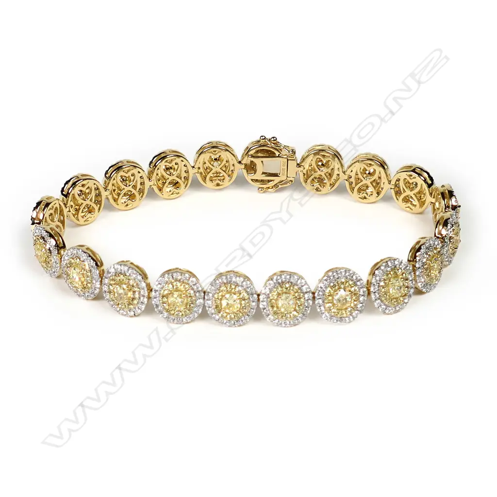 An 18ct white gold and yellow and white diamond bracelet Image 1++