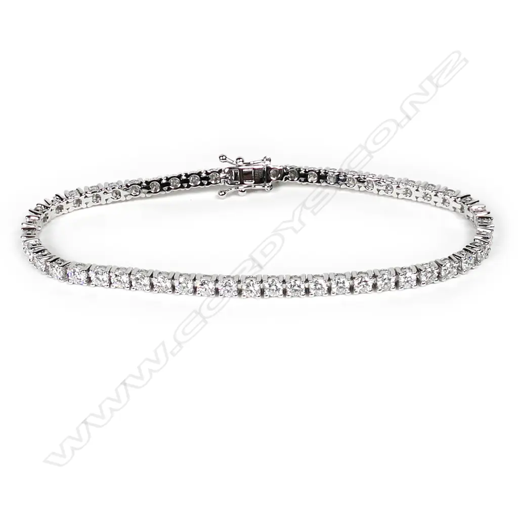 An 18ct white gold and diamond tennis bracelet Image 1++