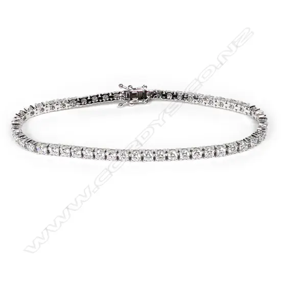 An 18ct white gold and diamond tennis bracelet