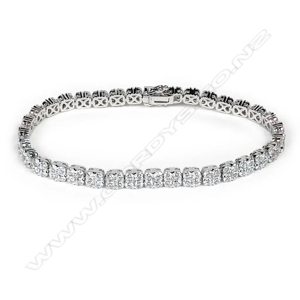 An 18ct white gold and diamond tennis bracelet Image 1++