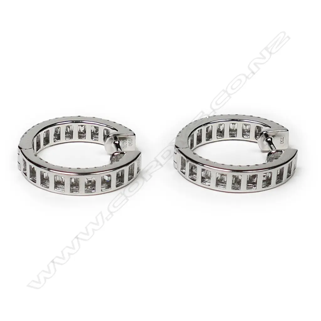 A pair of 18ct white gold and diamond hoop earrings Image 1++