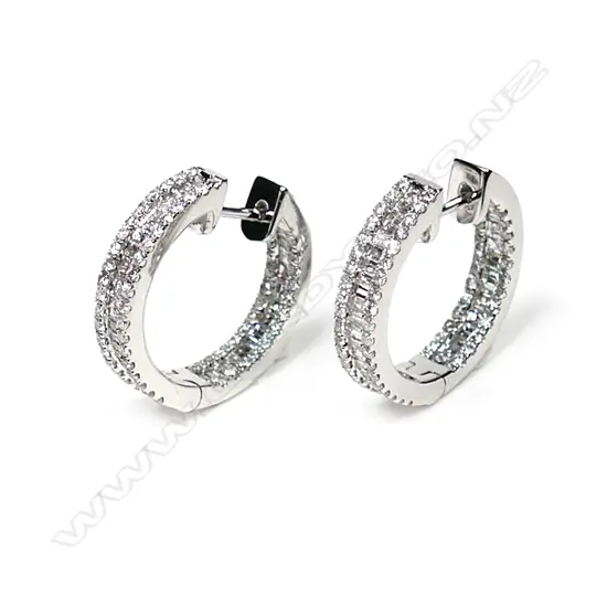 A pair of 18ct white gold and diamond hoop earrings