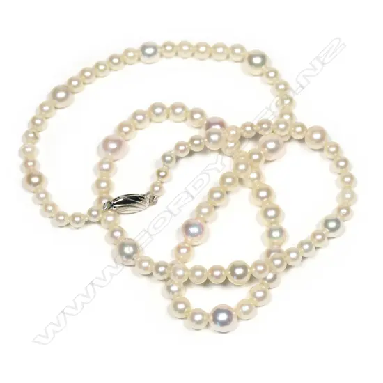 An Akoya pearl necklace, a single strand of ninety-four Akoya cultured pearls, (4.6mm - 8.1mm), white with pinkish overtones, with silver clasp.  Valuation available.