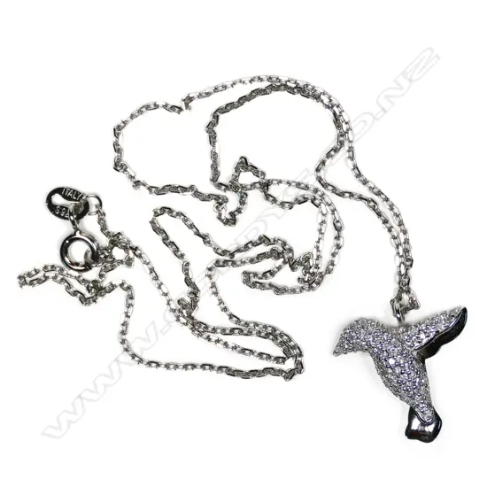 A 9ct white gold and diamond pendant, in the shape of a bird in flight, pave set with small diamonds, TDW 0.35ct, together with a sterling silver chain.