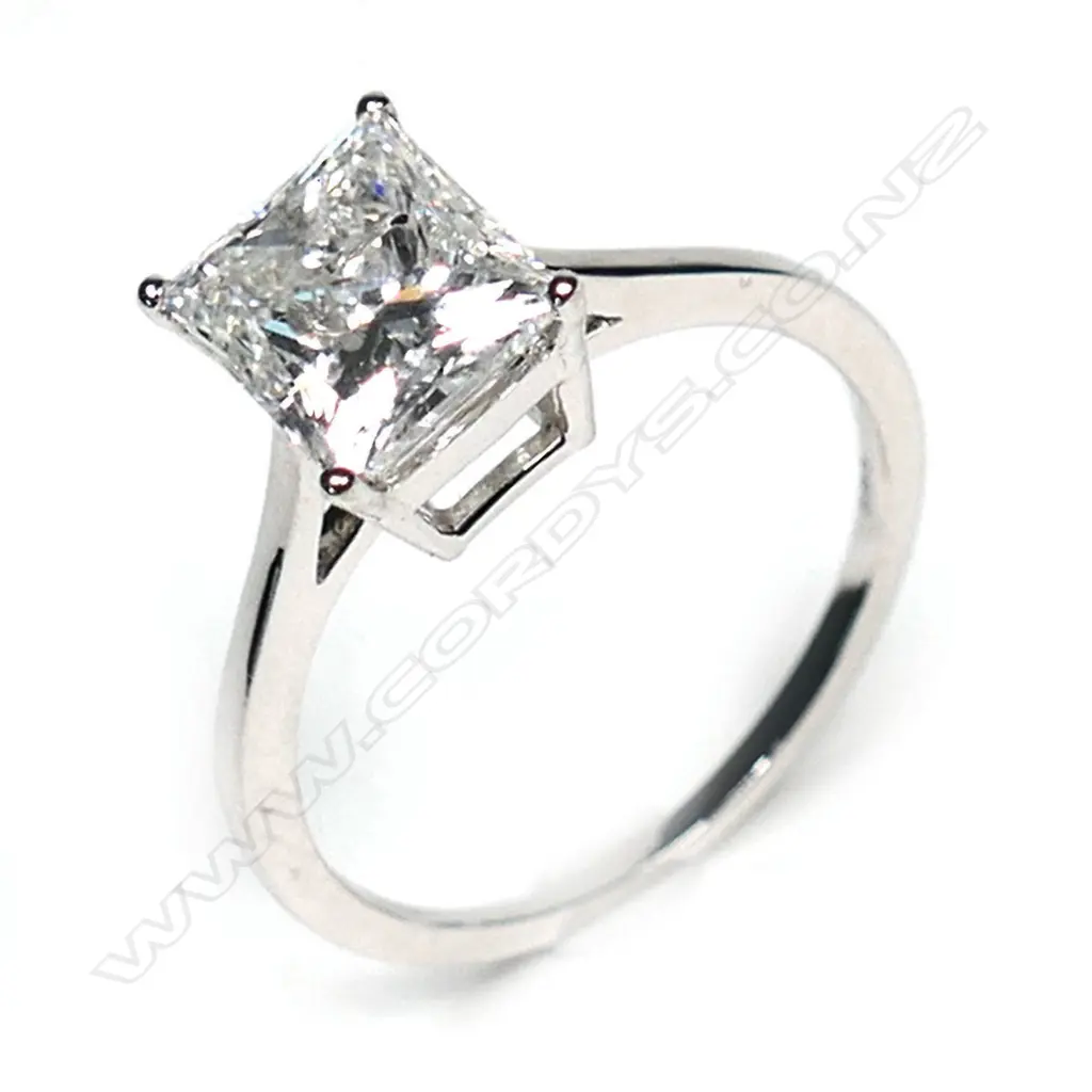 A 14ct white gold and diamond solitaire ring Image 1++
