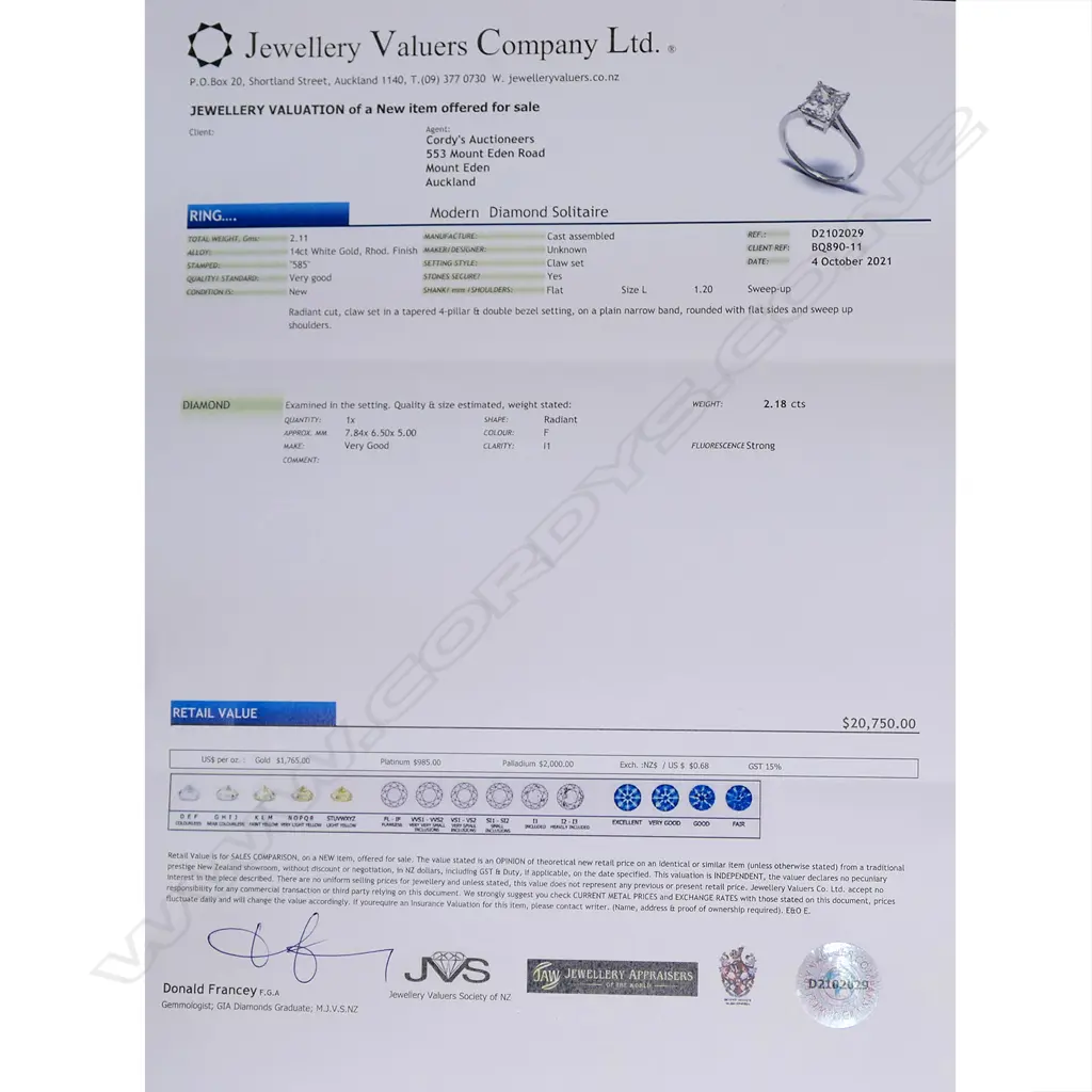 A 14ct white gold and diamond solitaire ring Image 1++