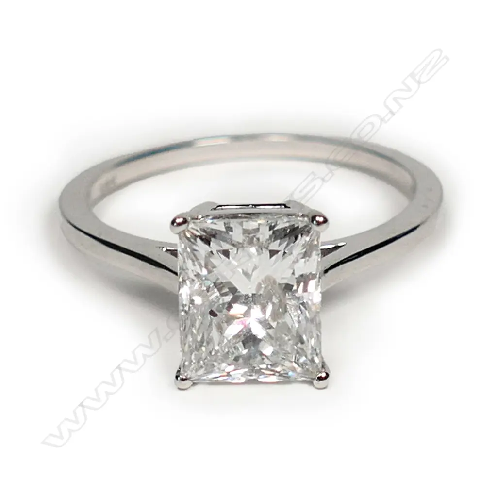A 14ct white gold and diamond solitaire ring Image 1++
