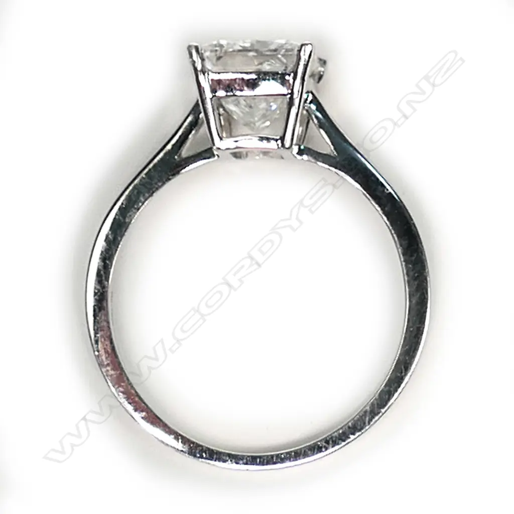 A 14ct white gold and diamond solitaire ring Image 1++