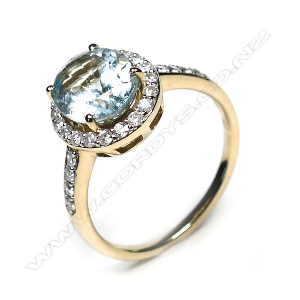 A 14ct gold, aquamarine and diamond halo ring, a 2.54ct oval cut greyish-blue aquamarine (eye visible inclusions), claw set and surrounded by a halo of round brilliant cut diamonds with a further four diamonds set to each shoulder, (H-J colour, SI1-I2 clarity), TDW 0.41ct, ring size P. Image 1++