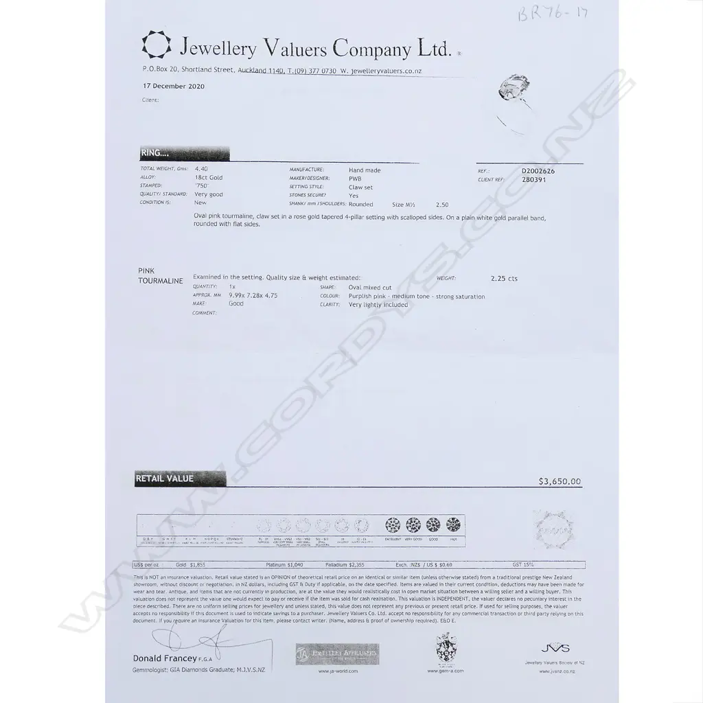 An 18ct white and yellow gold pink tourmaline ring, the 2.25ct oval mixed cut pink tourmaline claw set in yellow gold on a plain white gold band.  Valuation available. Image 1++