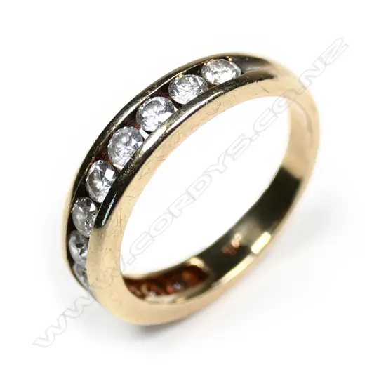 A 18ct gold 12 stone diamond ring, channel set, TDW. 1.95cts. Valuation available.