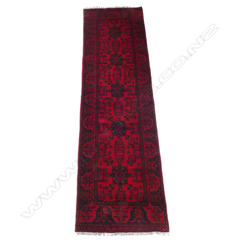 An Afghan Andkhoi runner, decorated with geometric patterning along its length. 3000 x 830mm Image 1++