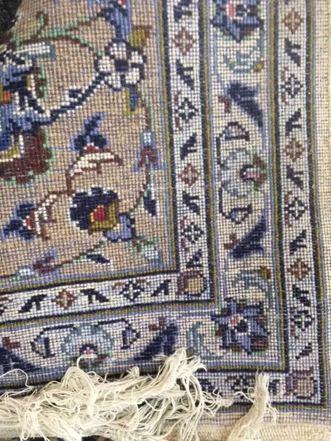 A Persian hand knotted carpet, curvilinear flowering tendril design in pale tones. One lighter area and minor signs of wear. 3500 x 2550mm. Image 1++