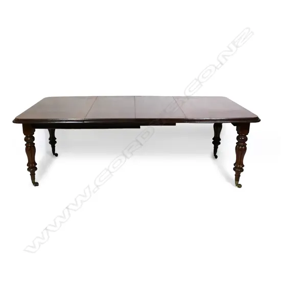 A Victorian eight-seater mahogany dining table
