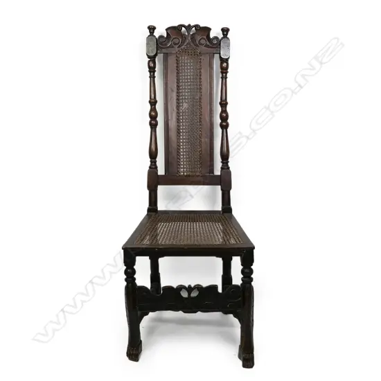 A George III fruitwood Jacobean style chair, panelled cane seat and high back. Some old repairs and borer.