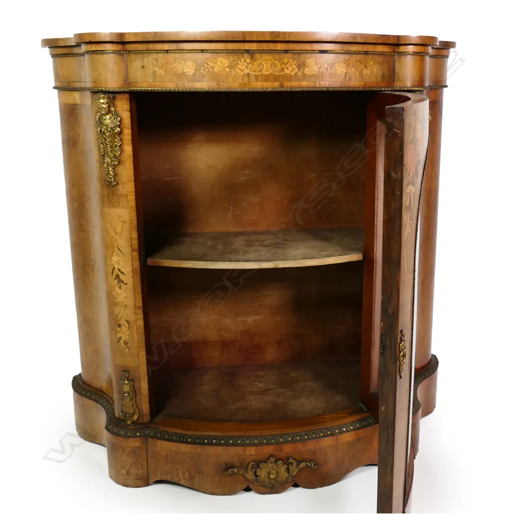 A late Georgian corner cabinet, inlaid panel to door, the interior with three scalloped shelves.  780 x 470 x 1065mm. Image 1++