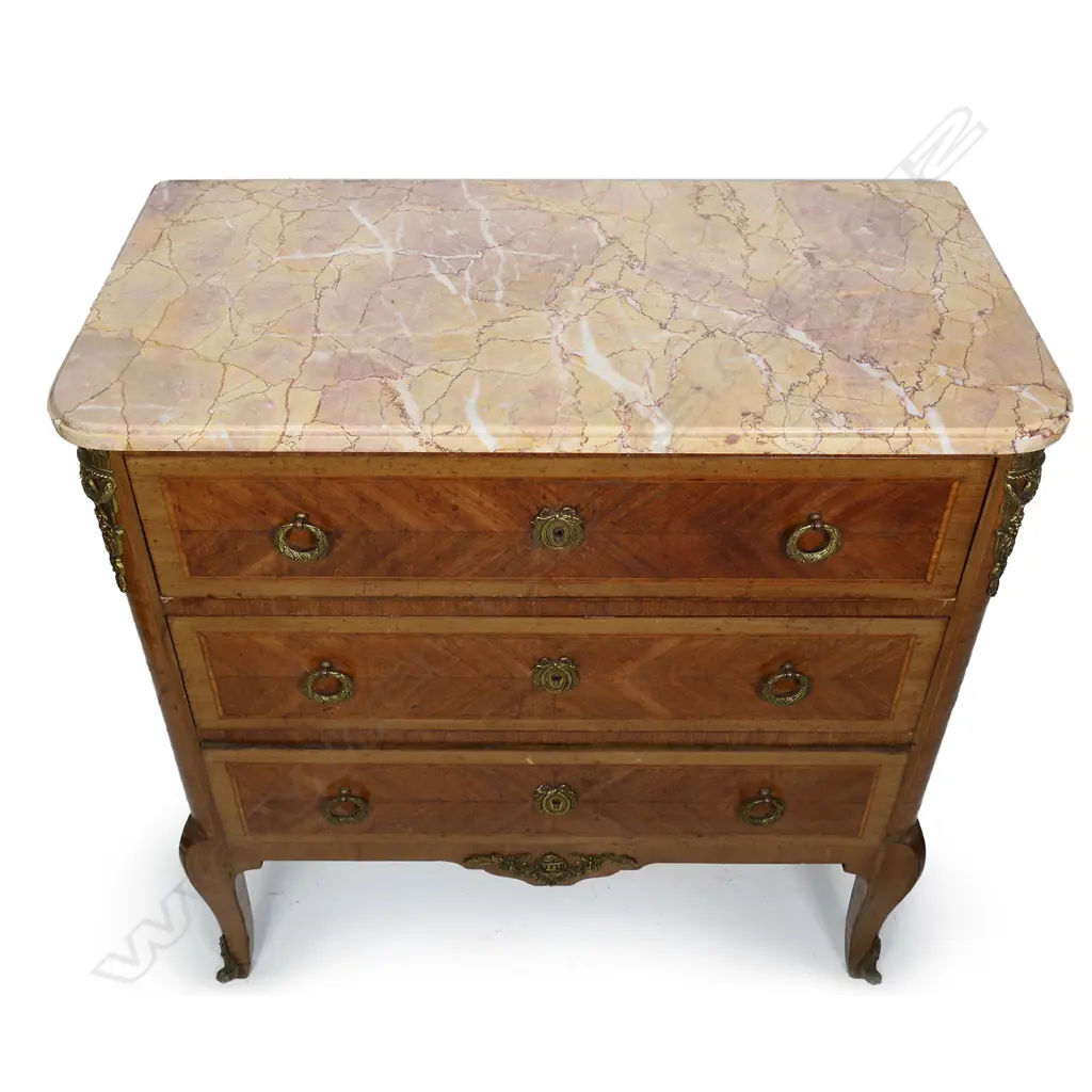 A French marble top three drawer commode, variegated marble top with ormolu embellishments, raised on chamfered tapering legs.  800 x 410 x 860mm. Image 1++