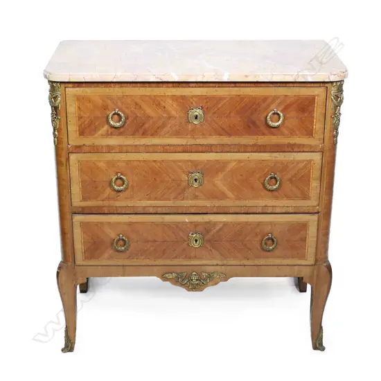 A French marble top three drawer commode, variegated marble top with ormolu embellishments, raised on chamfered tapering legs.  800 x 410 x 860mm.