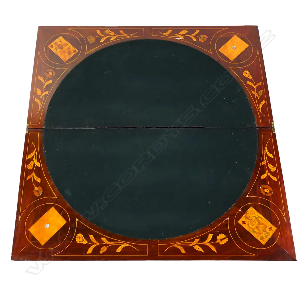 A 19thC Dutch marquetry card table, the top inlaid with flowers and a bow, the interior lined with black baize and inlaid with a suite of cards and more flowers, conforming inlaid decoration to the aprons and legs.  830 x 420 x 730mm. Image 1++