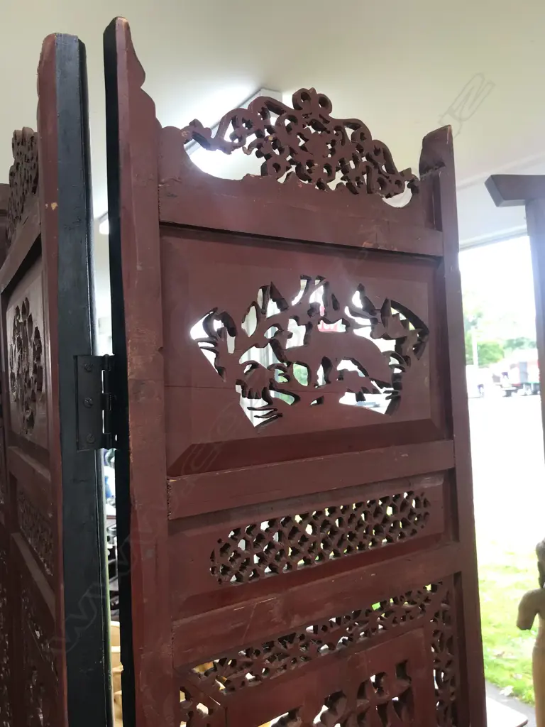 A 19thC six-fold Chinese screen, each panel with pierced decoration of calligraphy, birds and flowering branches, gilded with black and red paint finish, each panel measures 400 x 2050mm. Image 1++