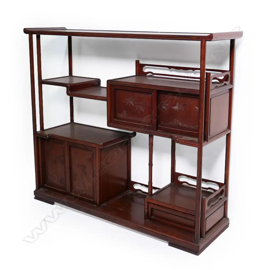 A good Chinese rosewood vintage display cabinet, with multiple open tiers, two pairs of doors and single drawer, rounded supports and plain cylinder columns, carved relief bamboo and bird decoration. 1115 x 320 x 970mm. Image 1++