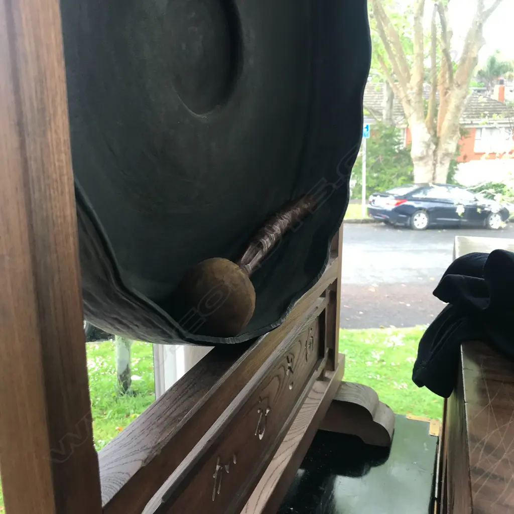A large old Japanese bronze temple gong in wooden stand Image 1++