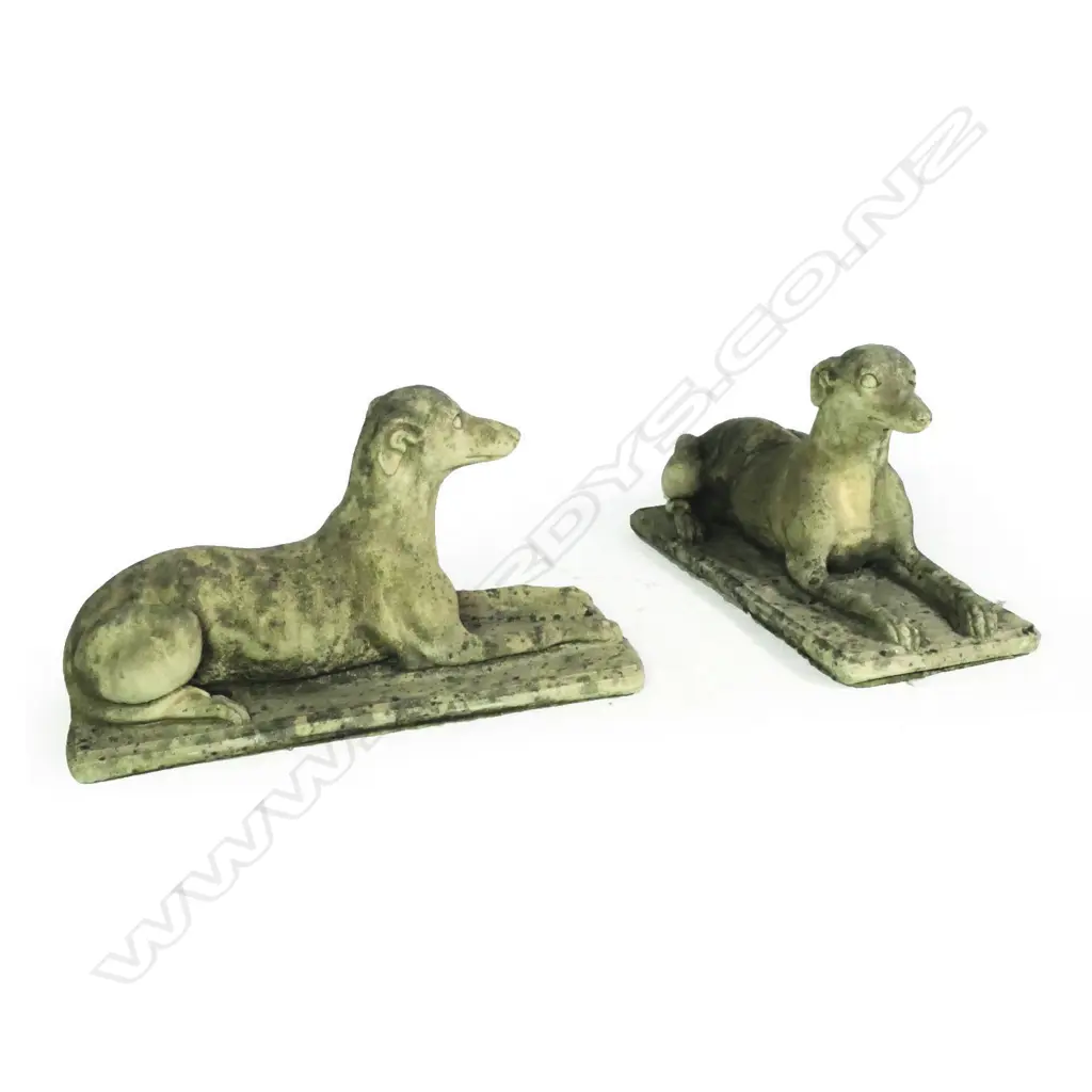 A pair of Church Stone greyhounds, in lying position, on plinth base, good weathered patina. L.700mm. Image 1++
