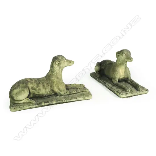 A pair of Church Stone greyhounds, in lying position, on plinth base, good weathered patina. L.700mm.