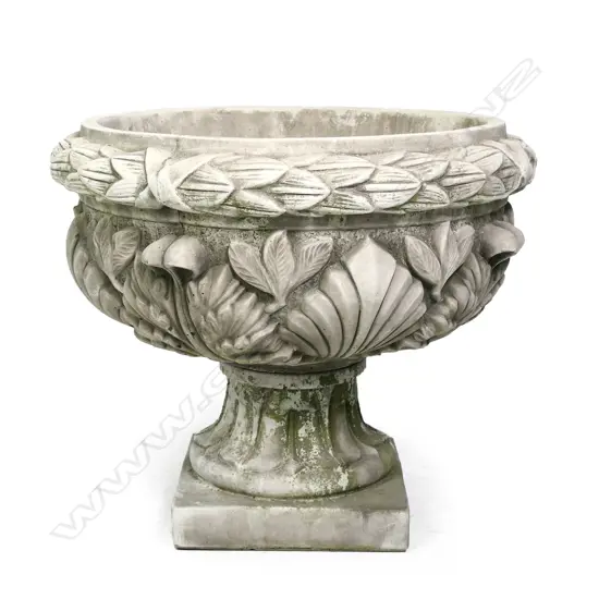 A quality English made cast concrete classical garden urn, wide form, decoratively cast in high relief with wreath boarder and leafy forms, the pedestal base with square foot. Dia.630mm. H.540mm.