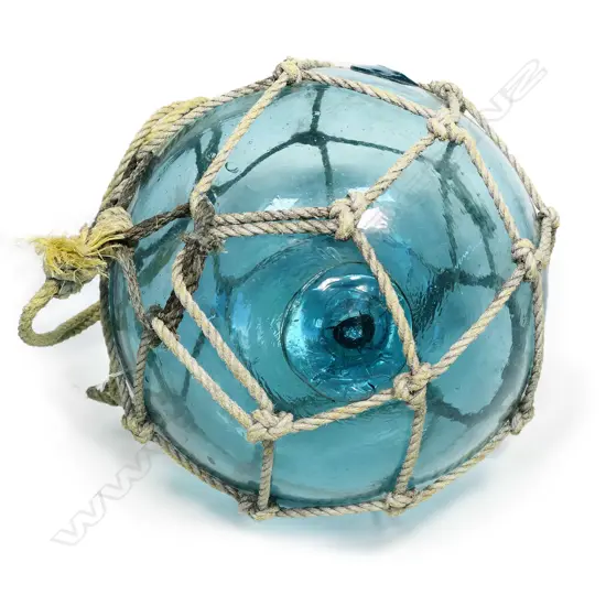 An old Japanese glass fishing float,