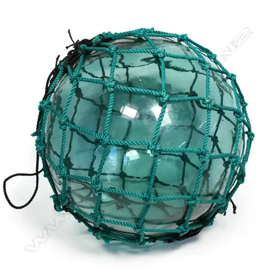 An old Japanese glass fishing float,