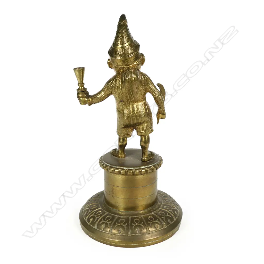 A vintage brass Mr. Punch cigar lighter Image 1++