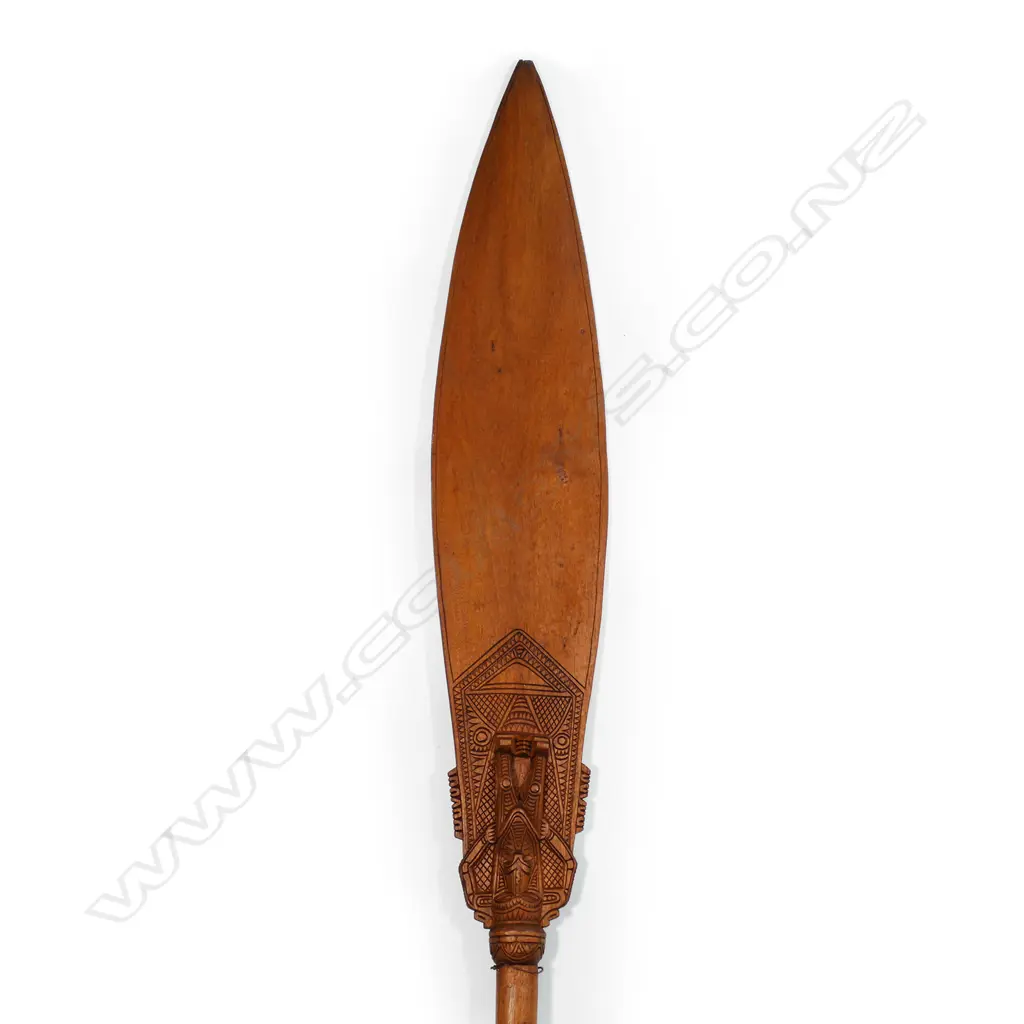 A hardwood carved, Papua New Guinea ceremonial paddle Image 1++