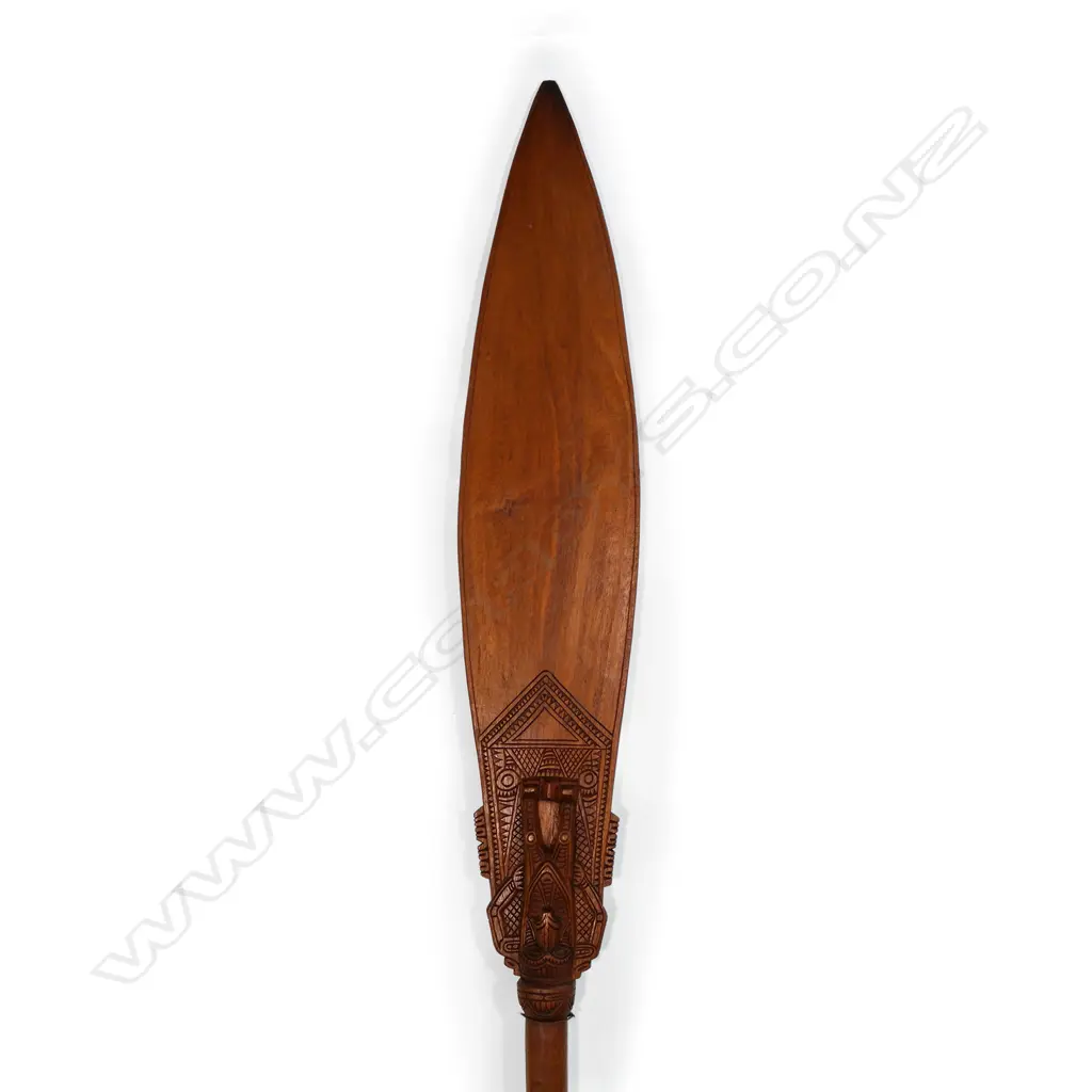 A hardwood carved, Papua New Guinea ceremonial paddle Image 1++