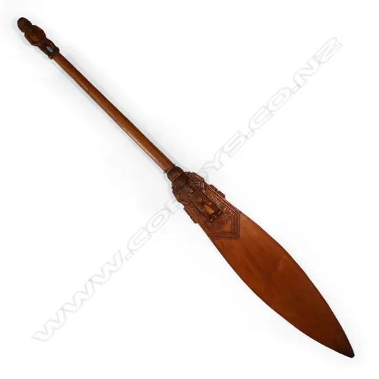 A hardwood carved, Papua New Guinea ceremonial paddle