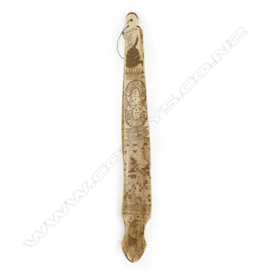 A shaman's astrological calendar engraved on a water-buffalo rib bone, Batak people, Sumatra, Indonesia,