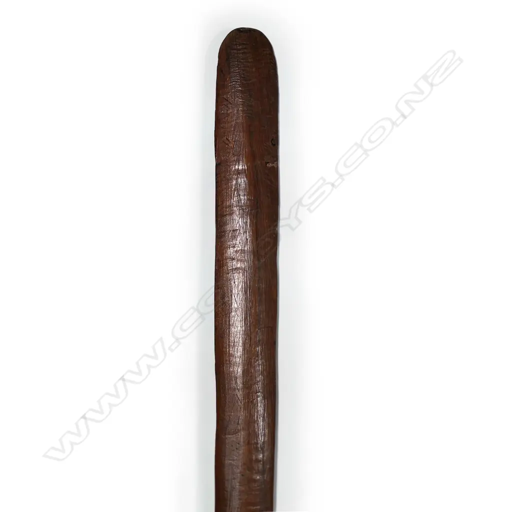 A 20thC Māori hardwood carved taiaha, of plain restrained short form. L.1090mm. Image 1++