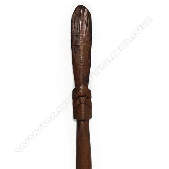 A 20thC Māori hardwood carved taiaha, of plain restrained short form. L.1090mm.