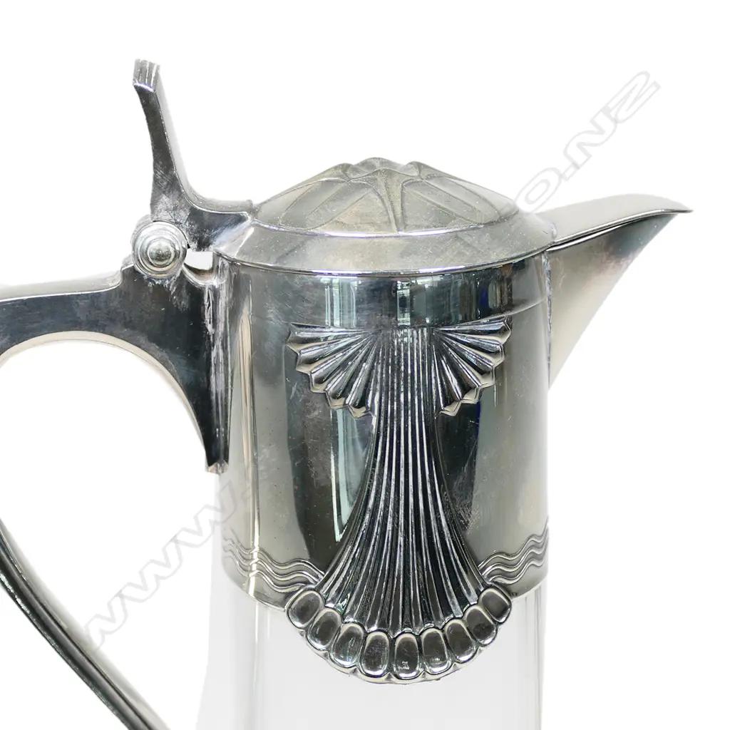 A WMF Art Nouveau silver plate and glass claret jug Image 1++