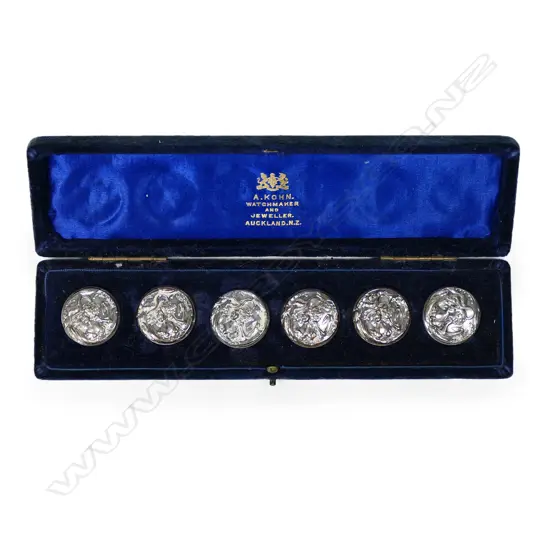 A boxed set of six Edwardian silver Art Nouveau maiden buttons,