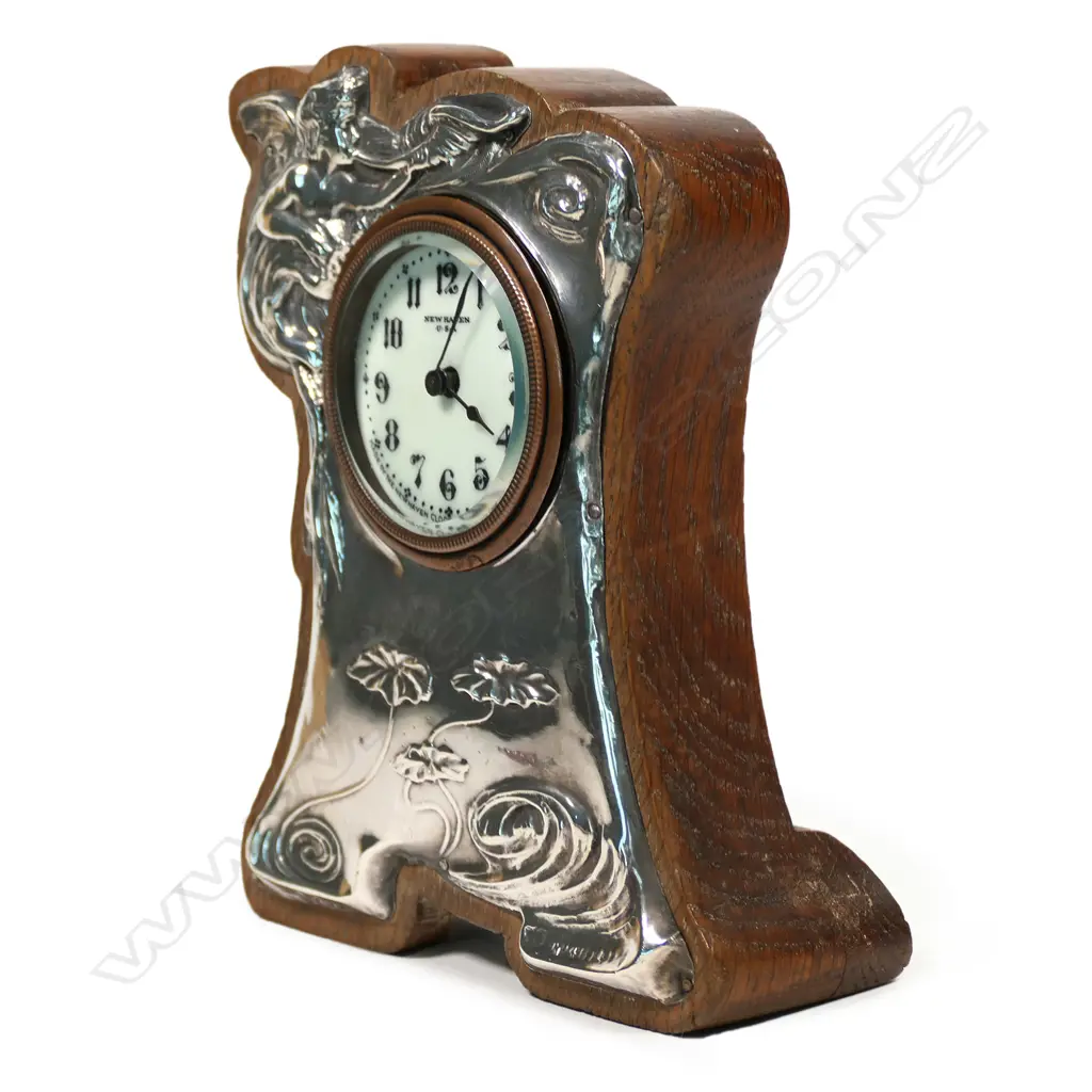 An Edwardian Art Nouveau silver and oak clock, Image 1++