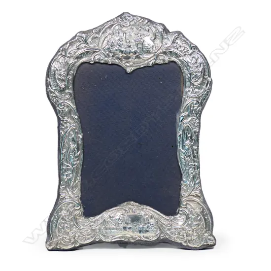 An antique style silver photo frame,