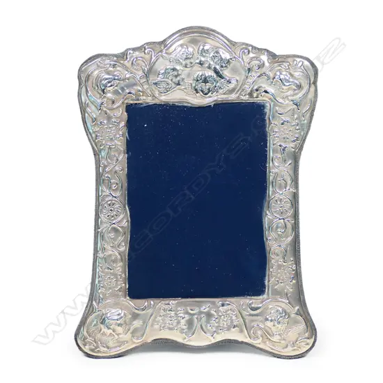 An antique style silver photo frame,