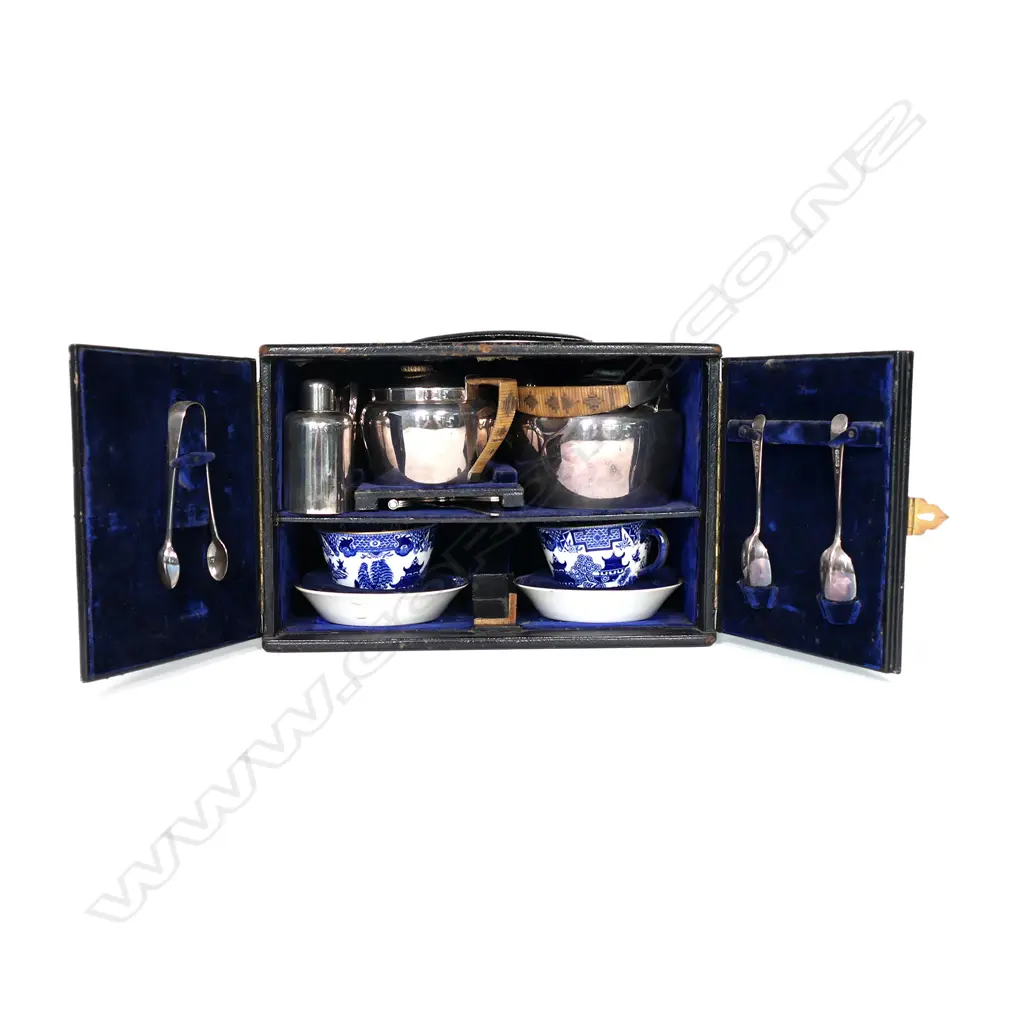 An early 1900s Royal Worcester and silver plate travelling tea set, Image 1++