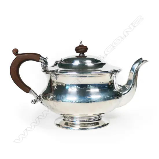 An early 20thC silver teapot,