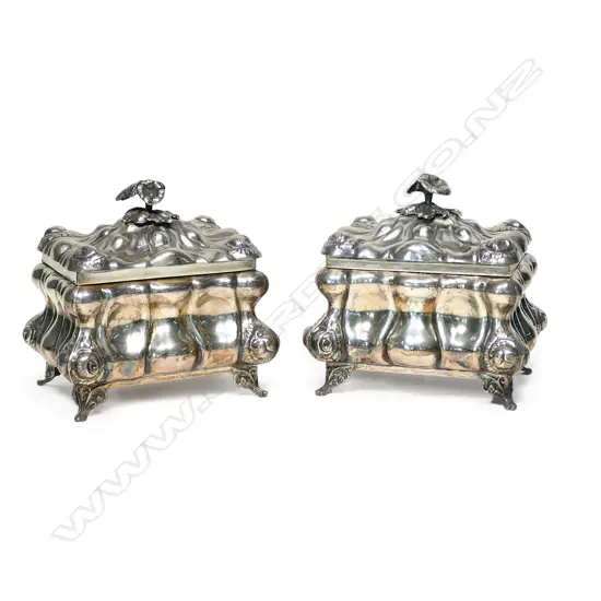 A pair of 925 sterling sugar boxes,
